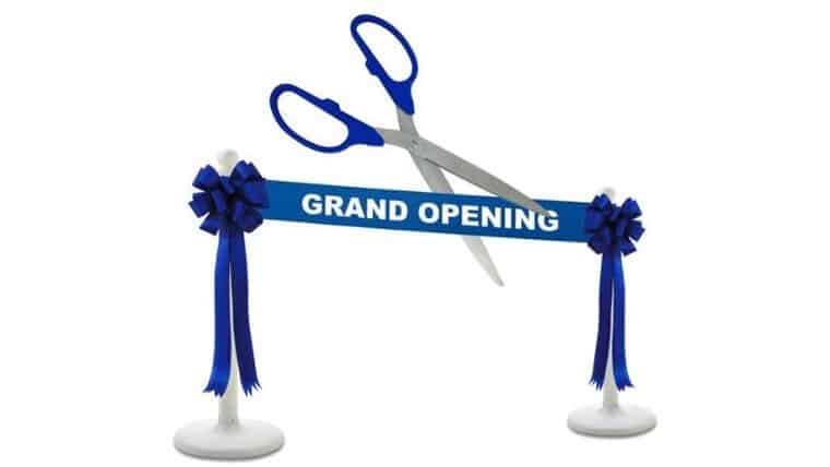 25″ Deluxe Grand Opening Kit – Blue/Blue Ceremonial Ribbon Cutting Scissors with 5 Yards of 6″ Red Grand Opening Ribbon, 2 Red Bows and 2 White Plastic Stanchions | Rental
