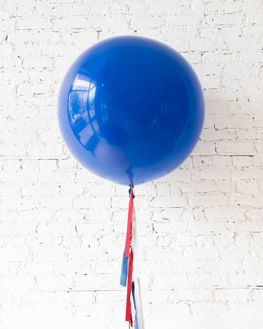 Dark Blue Giant Balloon and Red, White & Blue Palette Tassel | Rental Dark Blue Giant Balloon and Red, White & Blue Palette Tassel | Rental