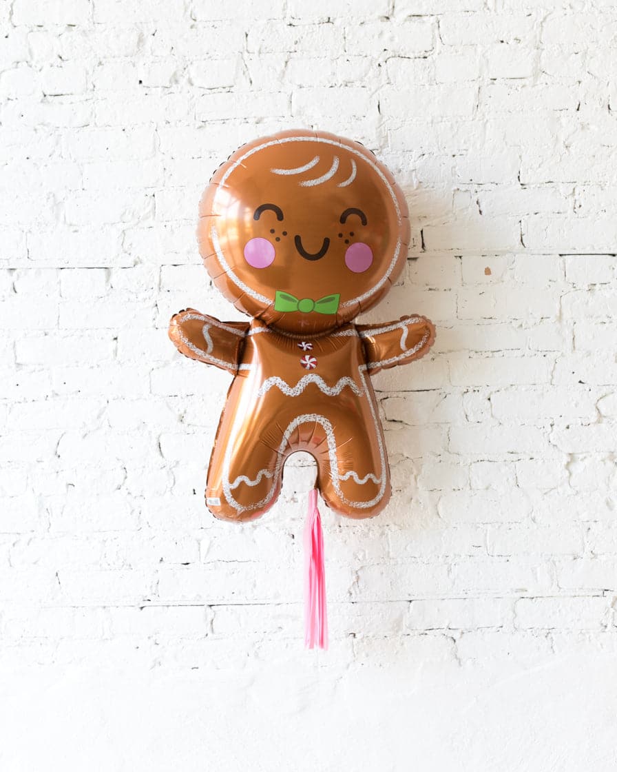 31in Gingerbread Foil Balloon with Pink Skirt | Purchase