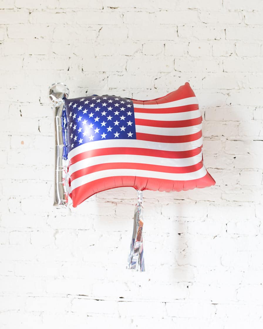 27in Flag Foil Balloon and Silver Skirt | Purchase